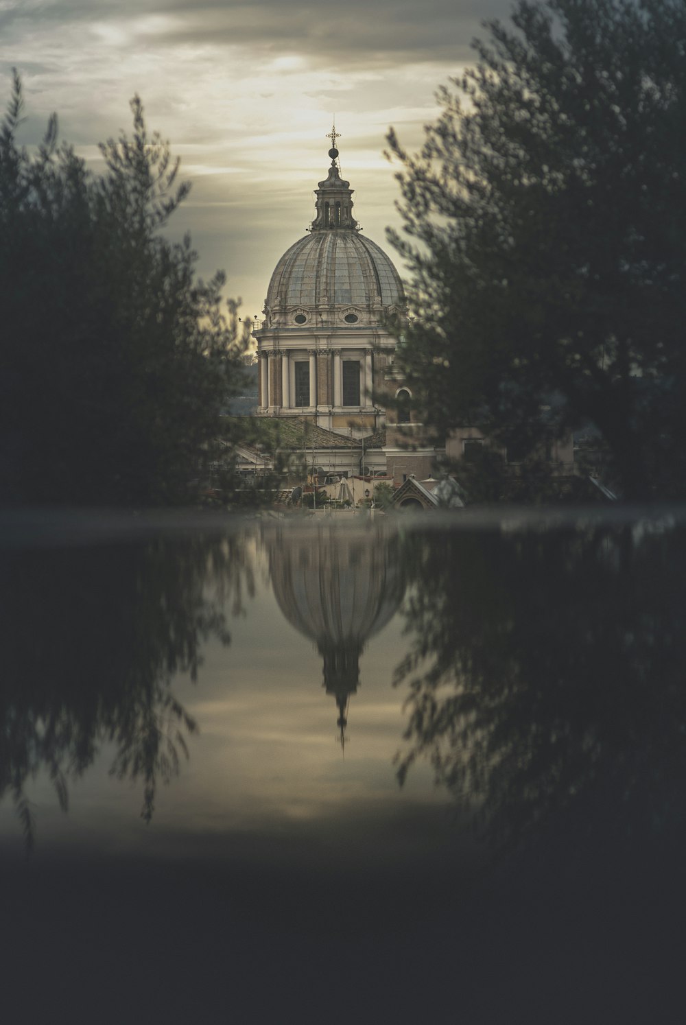 white dome building near trees during sunset