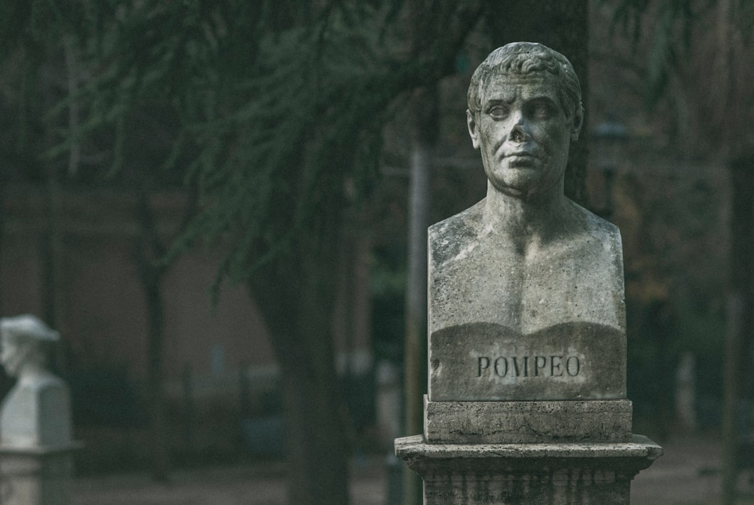 gray concrete statue of man