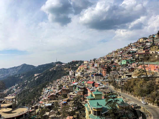 aerial view of city buildings during daytime in Shimla India