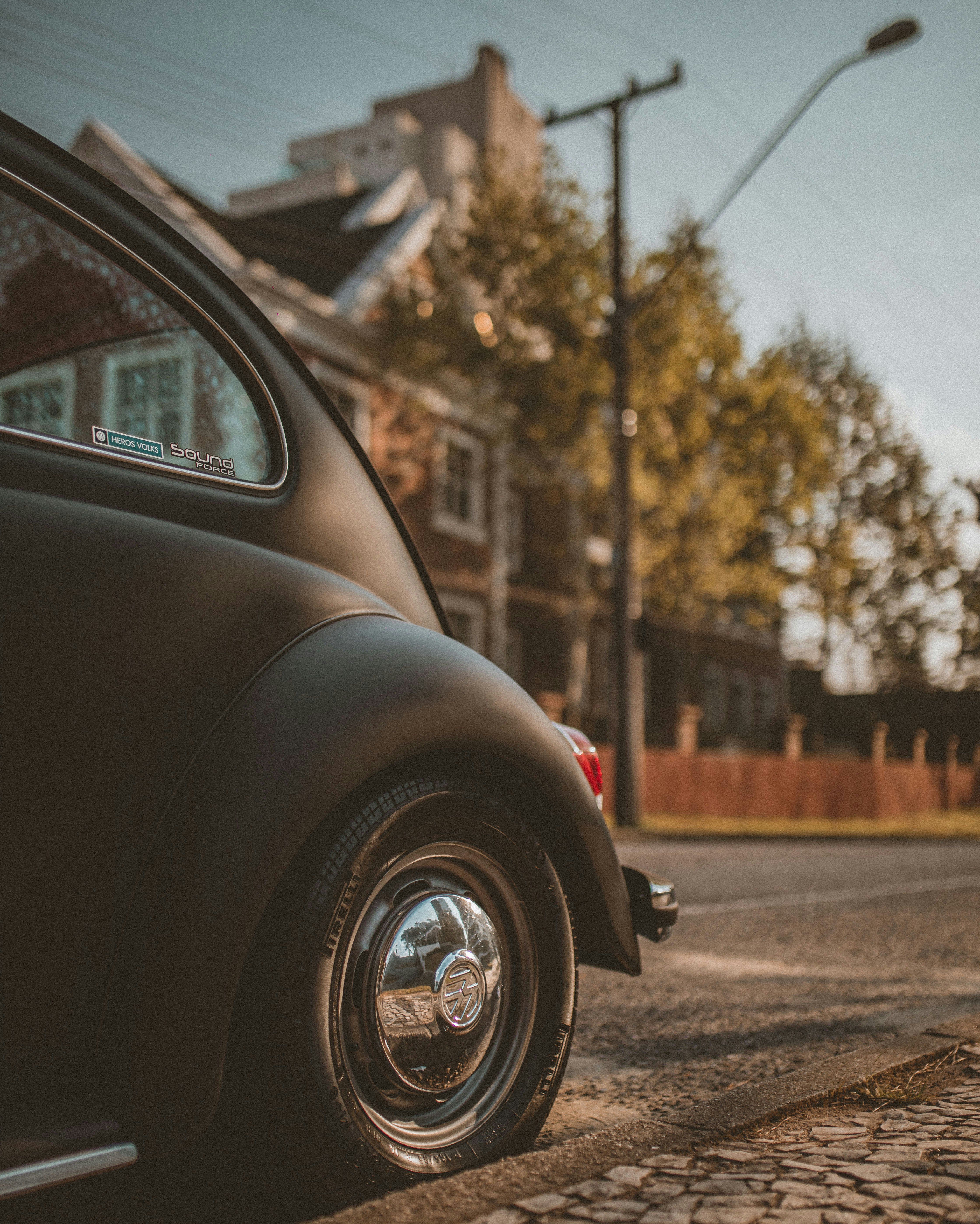 black car on road during daytime