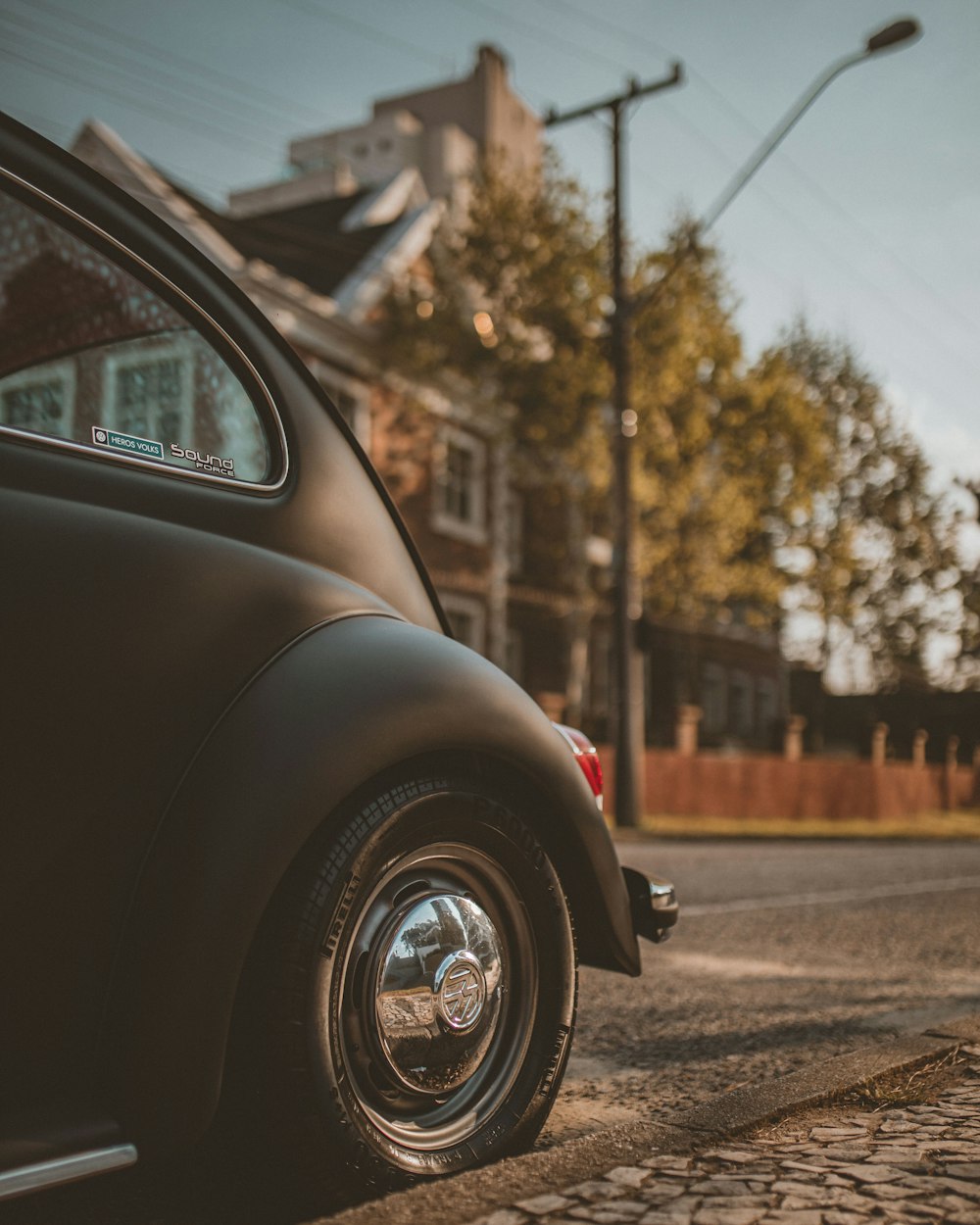 black car on road during daytime