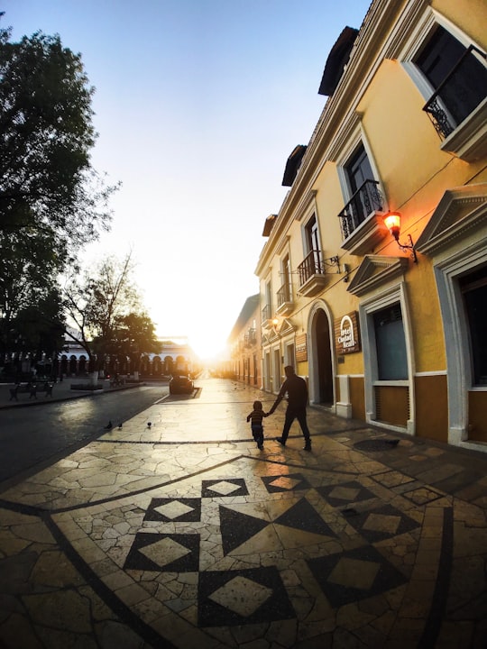 people walking on street during daytime in San Cristobal de las Casas Mexico