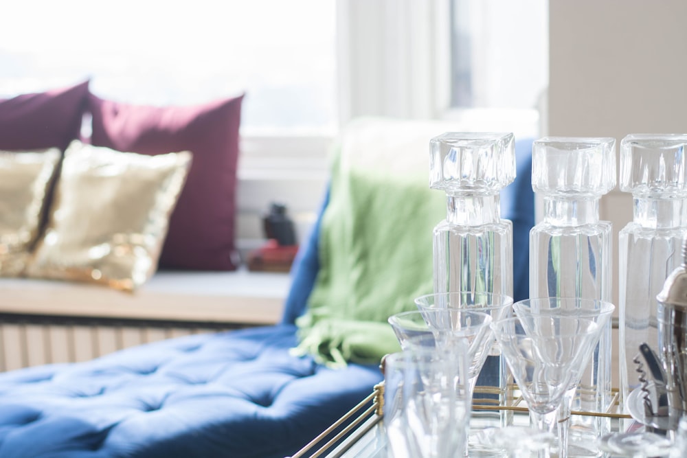 clear glass bottles on table