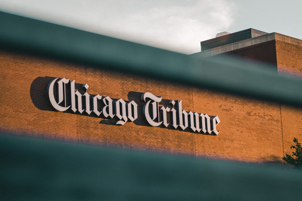 the chicago tribune sign on a brick building
