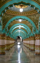 people walking on hallway inside building