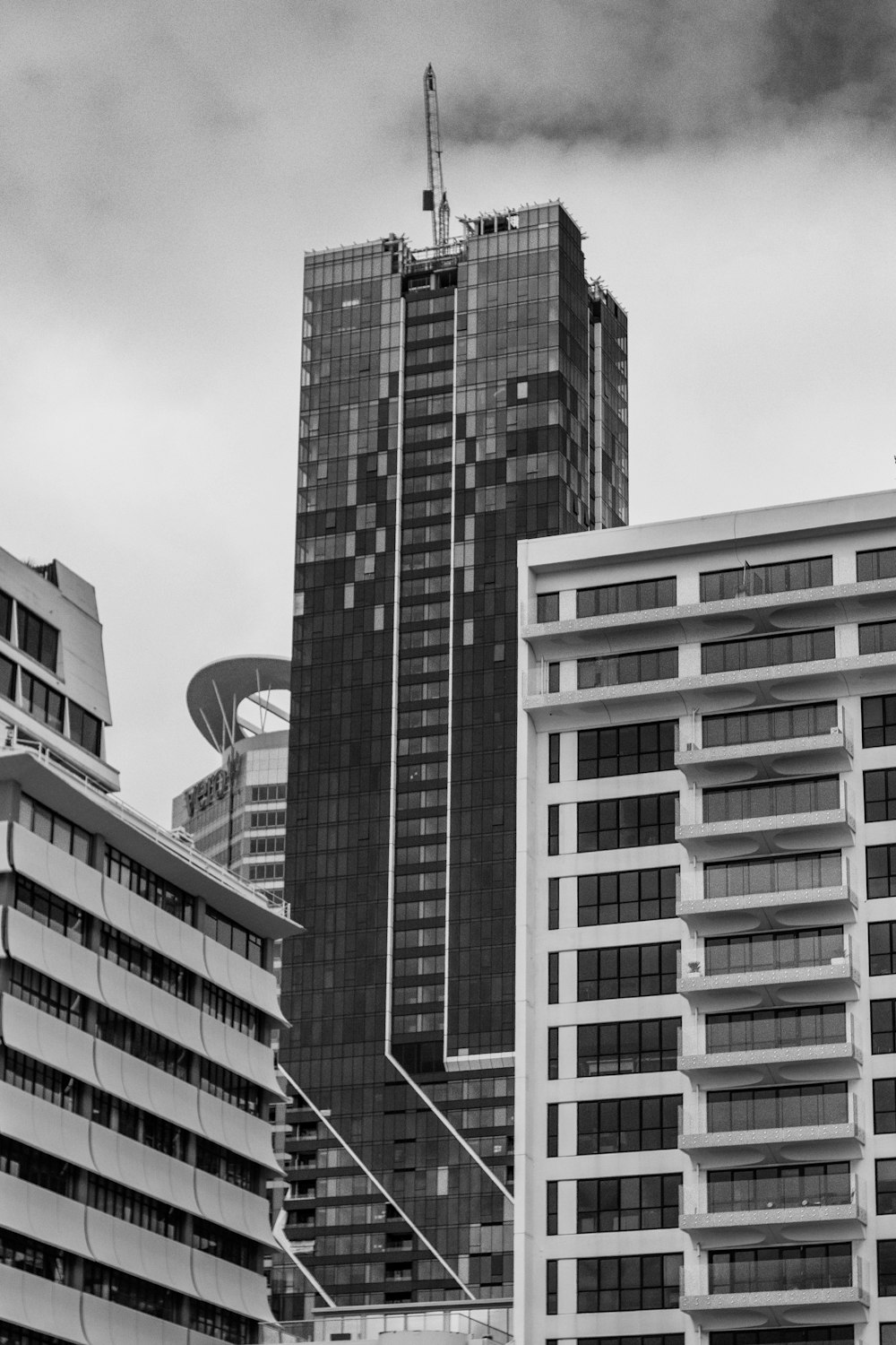 grayscale photo of high rise building