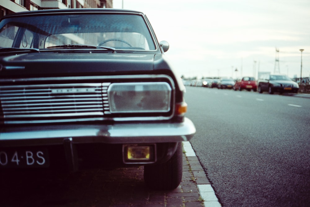 black car on road during daytime