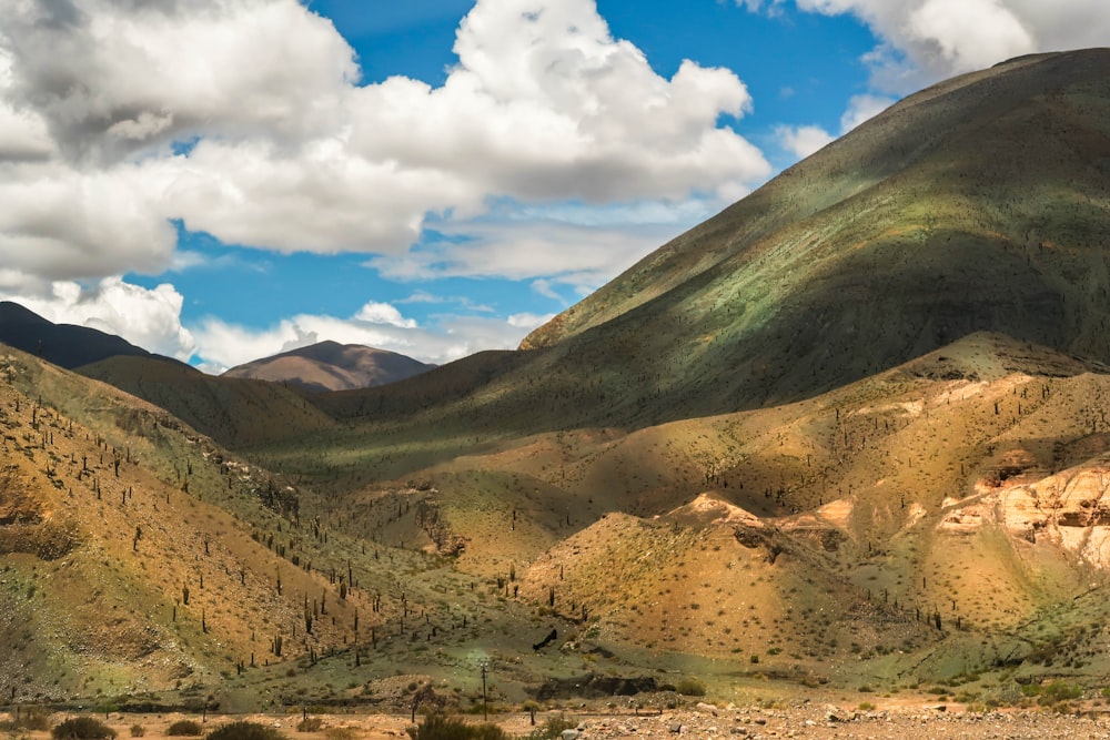 brown and green mountain under blue sky during daytime