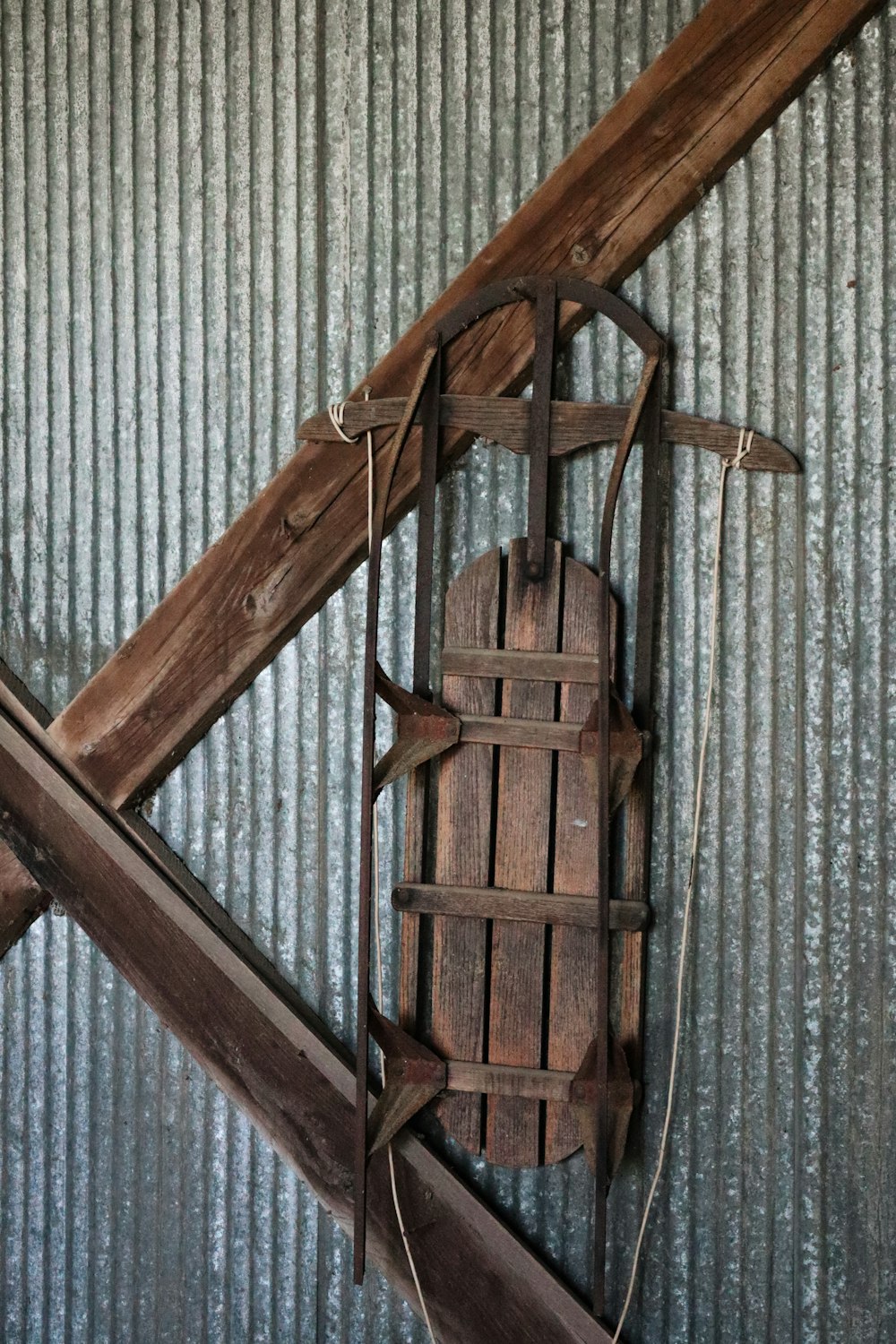 brown wooden ladder on gray textile