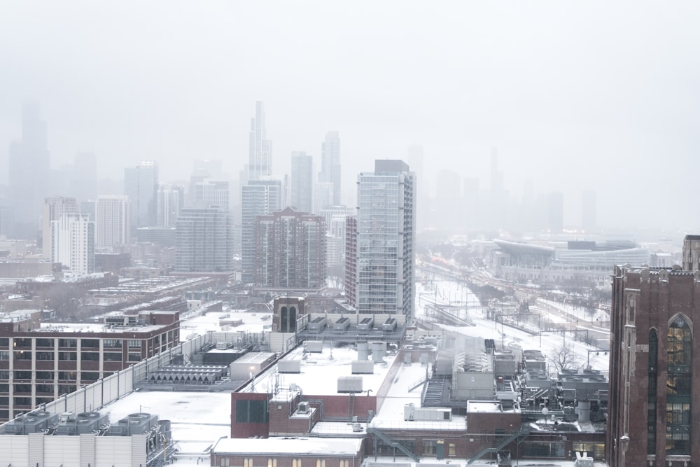 city buildings under white sky during daytime