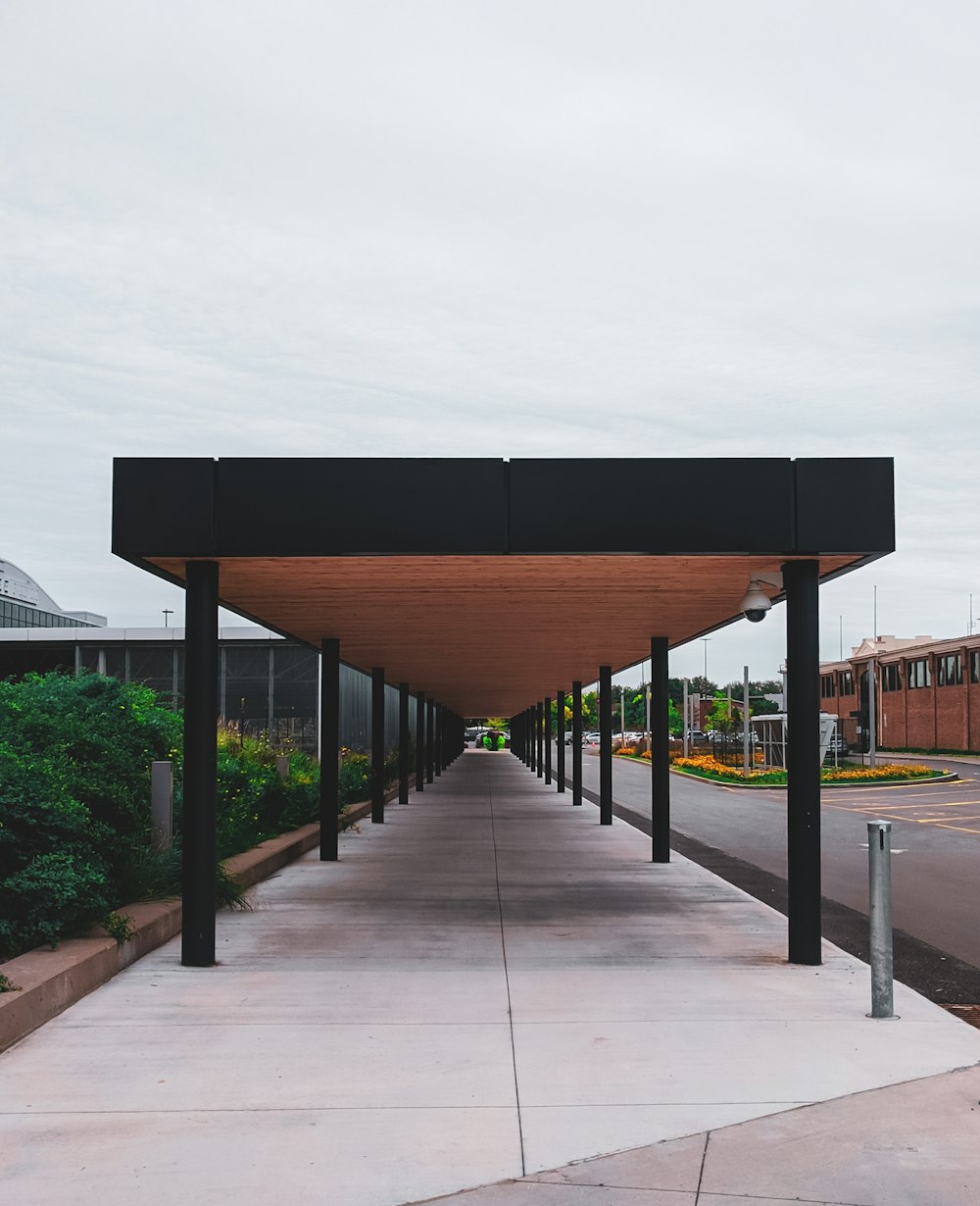 brown wooden dock under gray sky during daytime