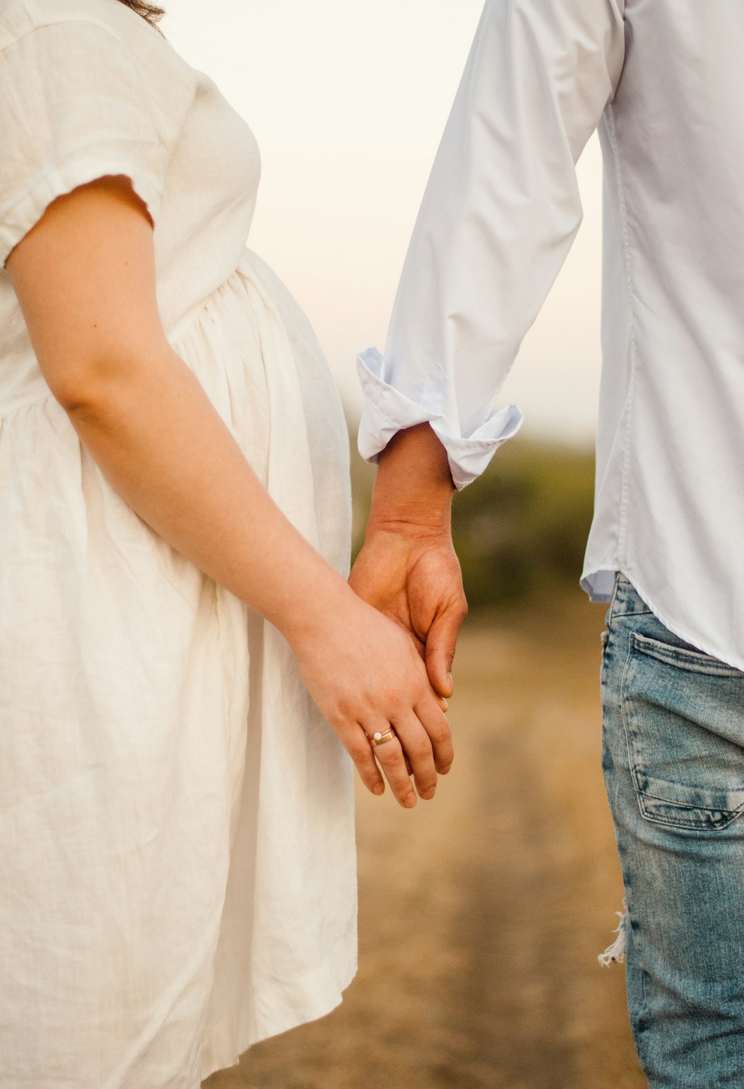 man and woman holding hands