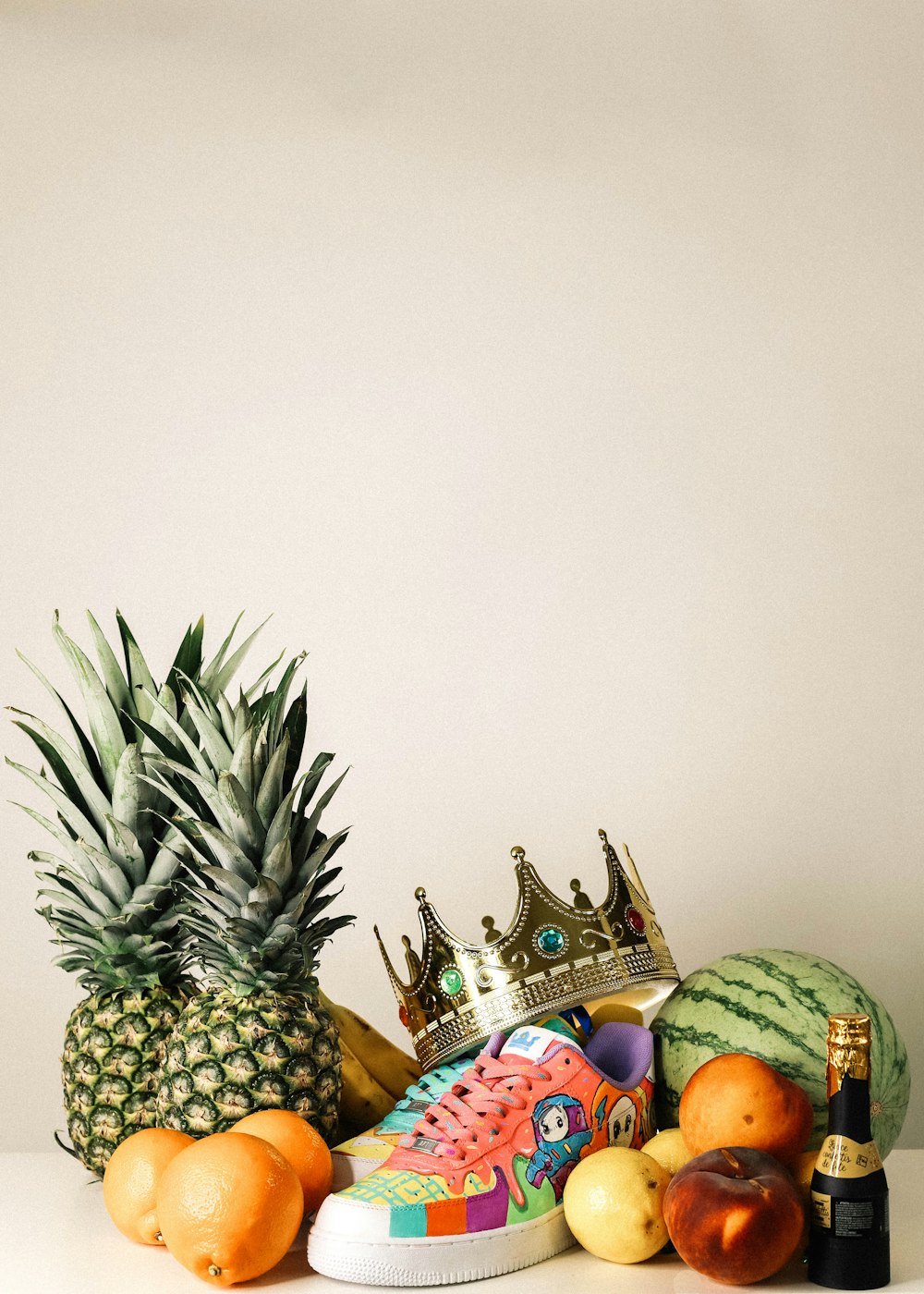 pineapple fruit beside green pineapple fruit