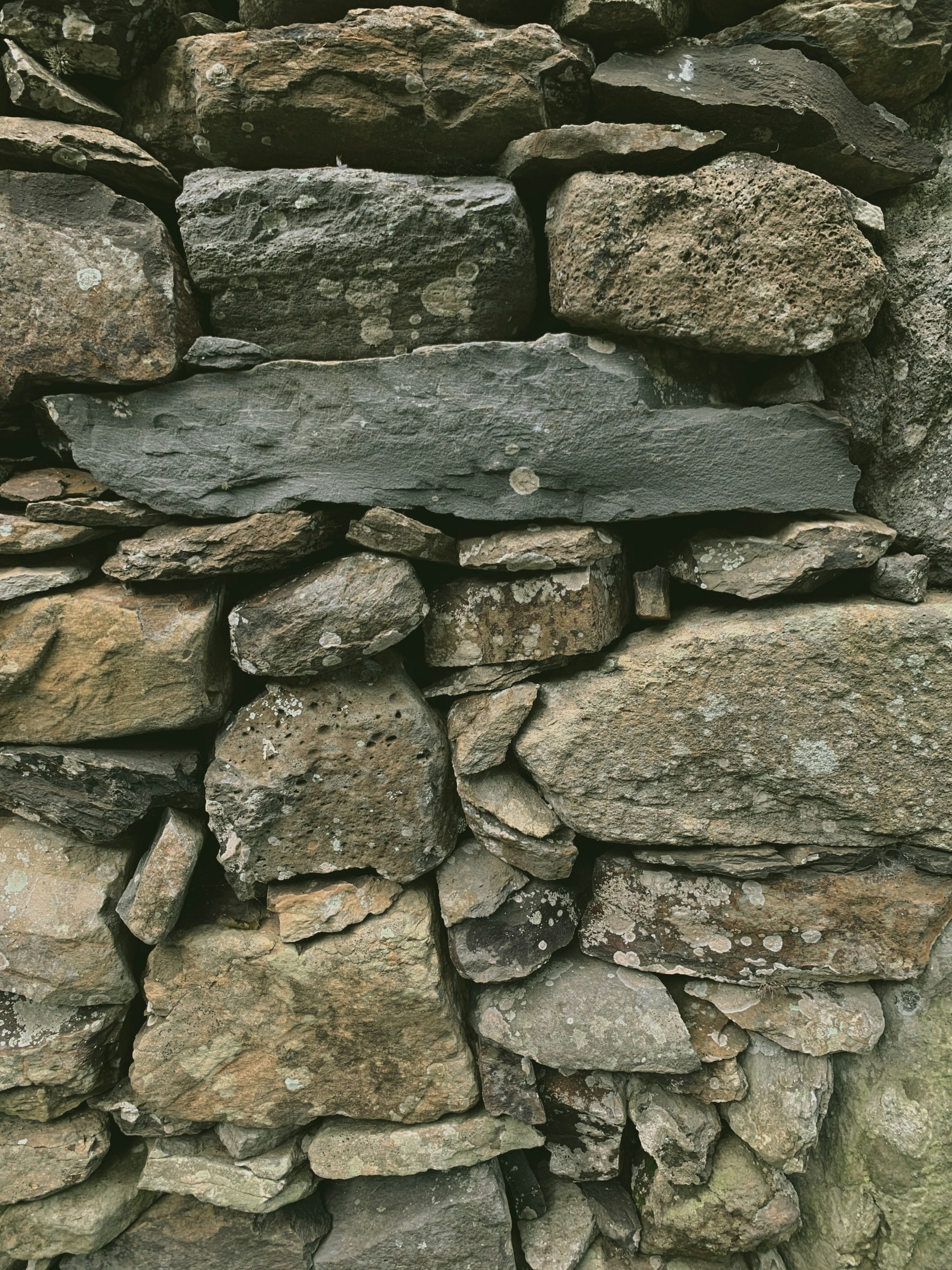brown and gray stone wall