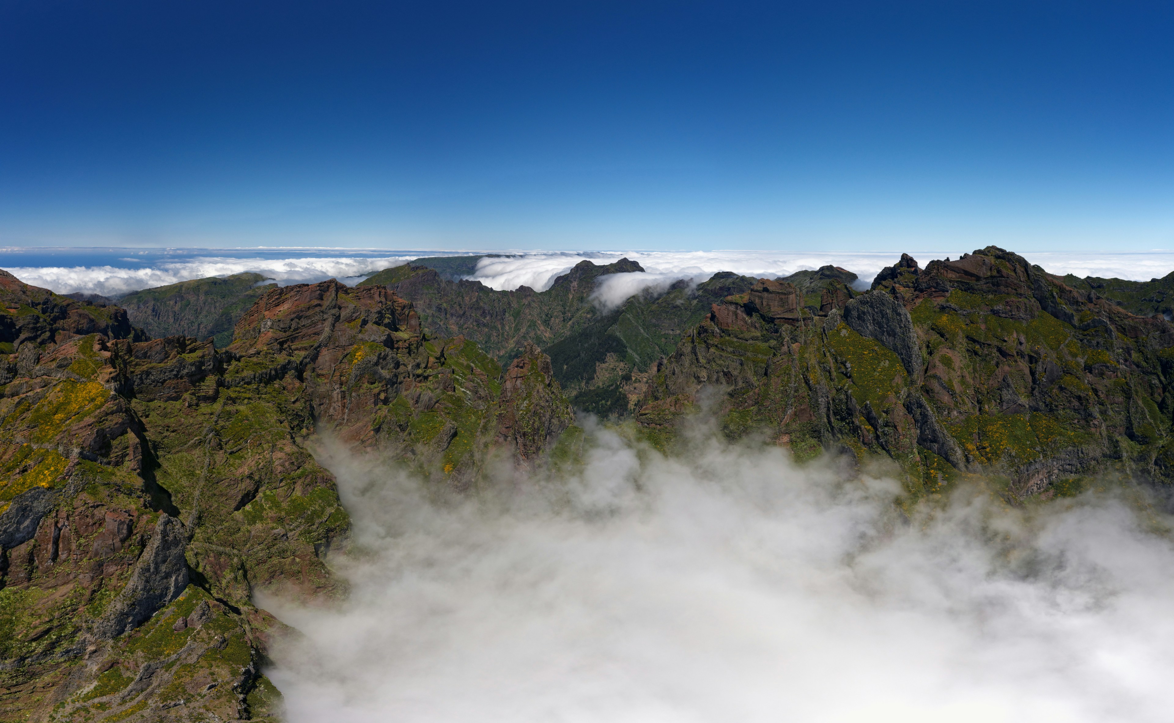 green and gray mountain under blue sky during daytime