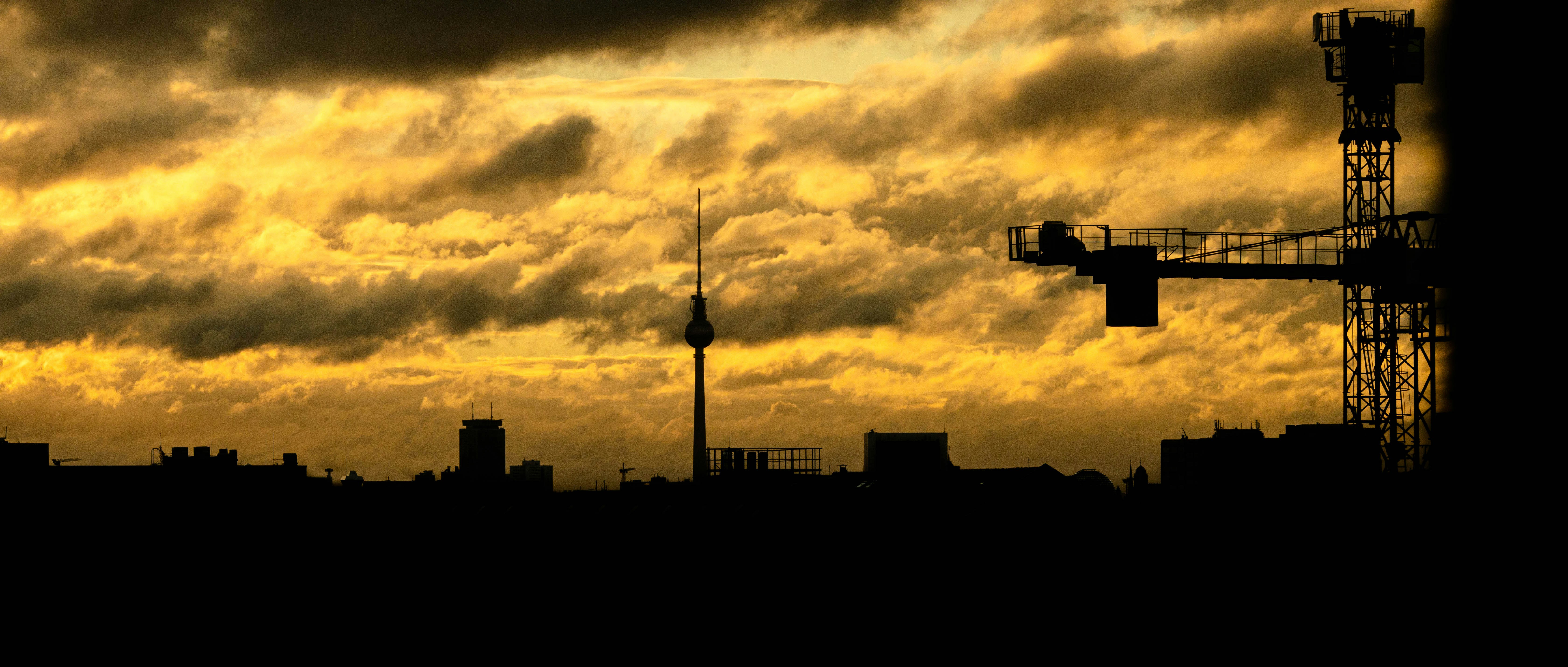 silhouette of building during sunset