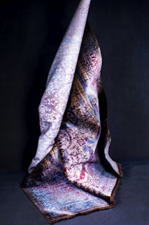 purple and white floral textile