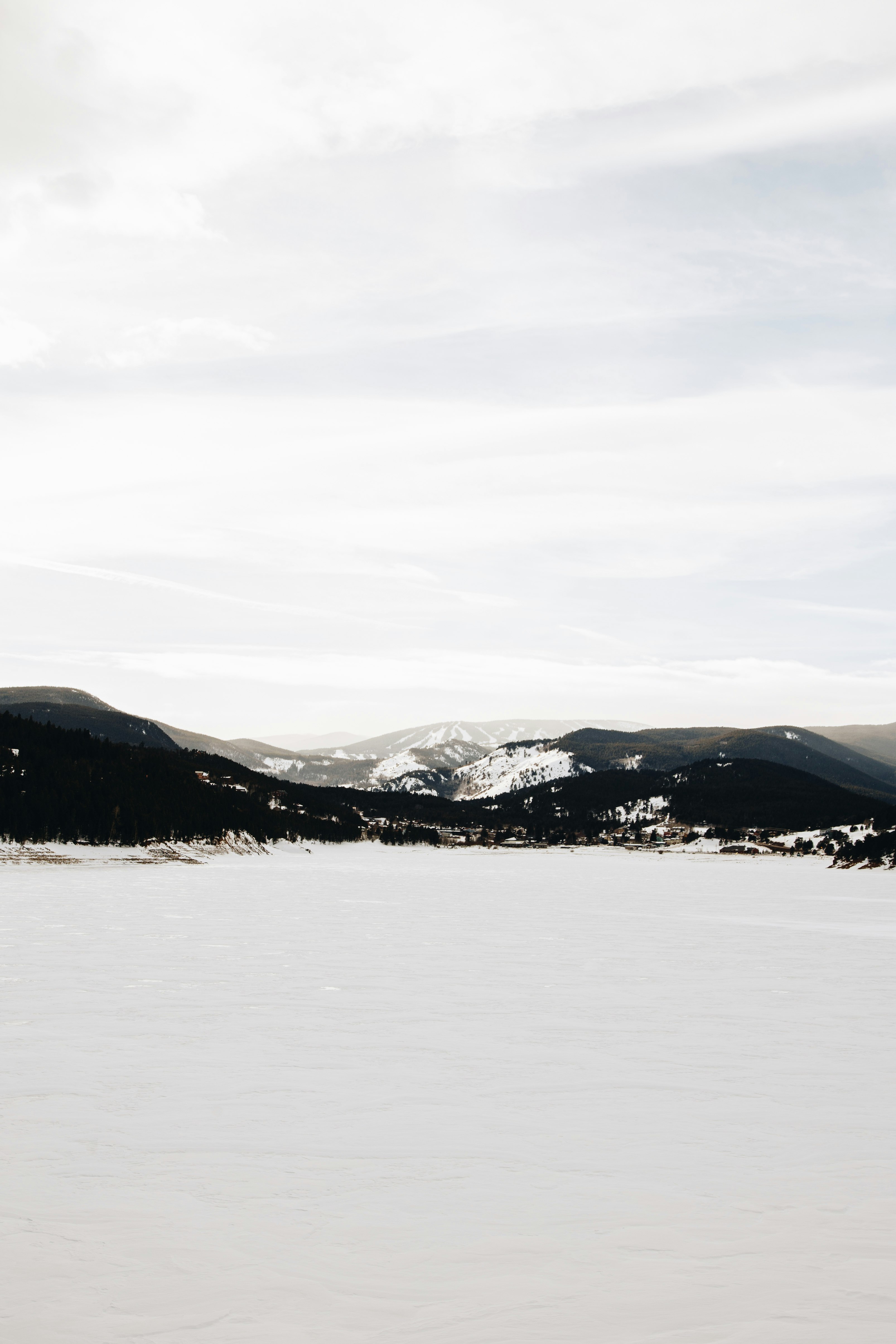 snow covered mountain during daytime