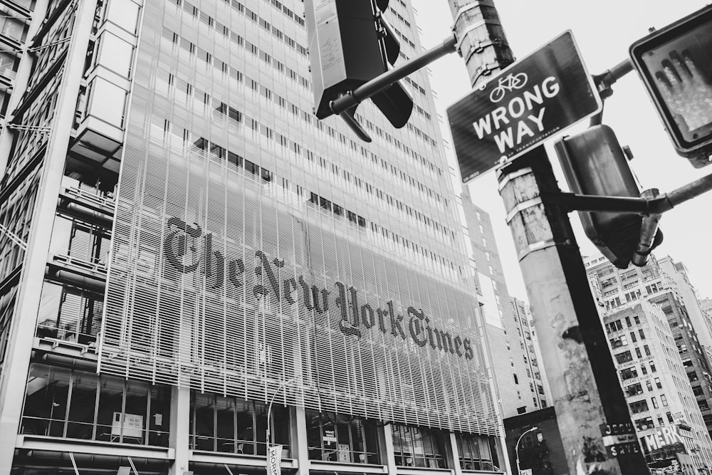 grayscale photo of city buildings