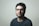man in black crew neck shirt wearing black framed eyeglasses