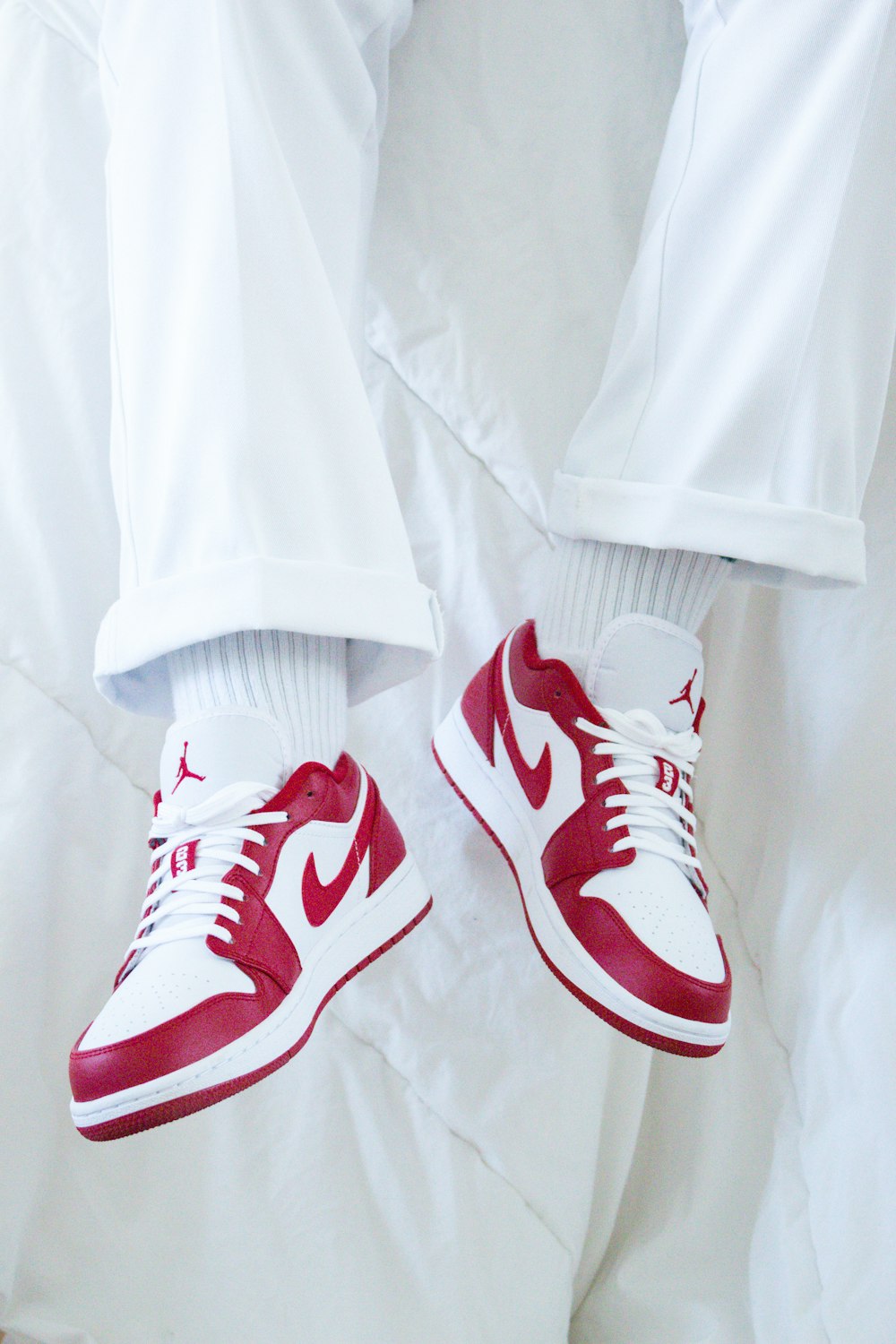 red and white nike sneakers