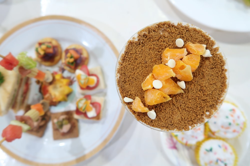 brown and white round cake on white ceramic plate