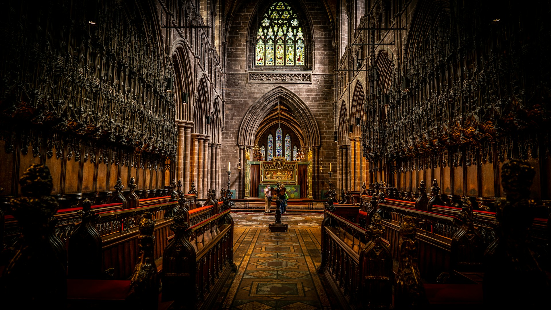 brown wooden bench inside cathedral