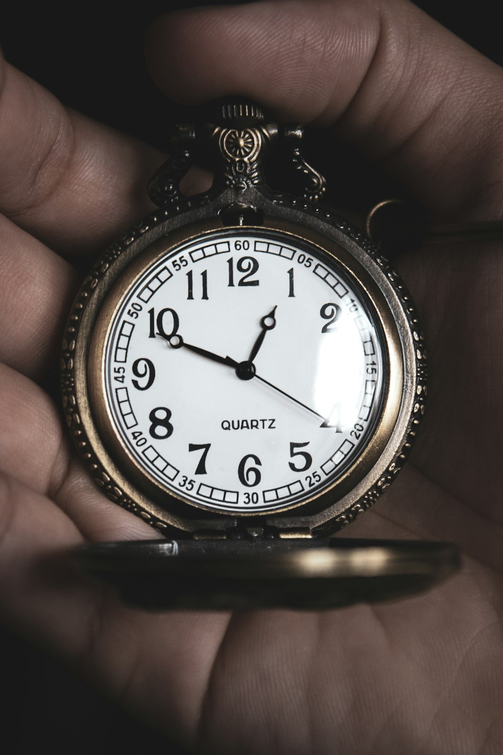 silver and white round analog watch