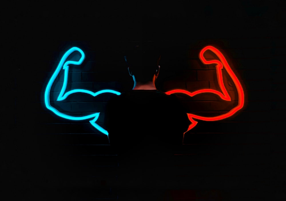 red and blue neon light signage
