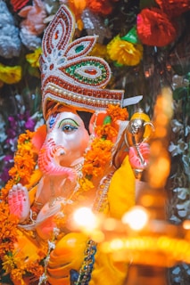 hindu deity figurine with string lights