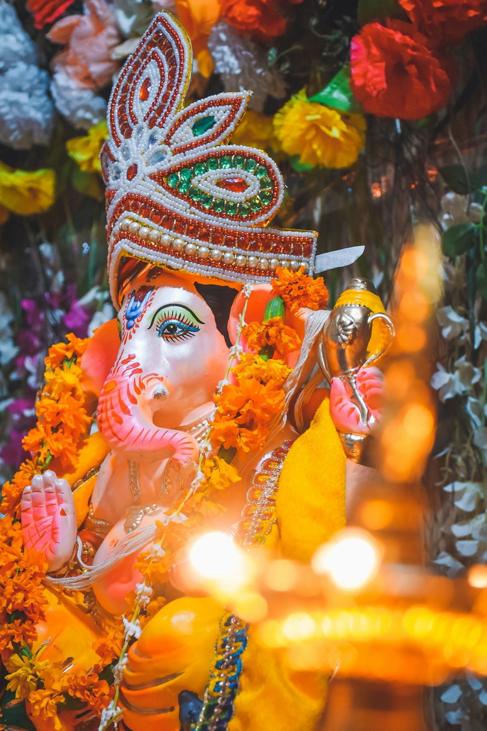 hindu deity figurine with string lights