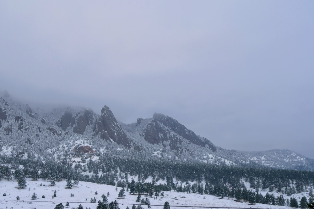 snow covered mountain during daytime