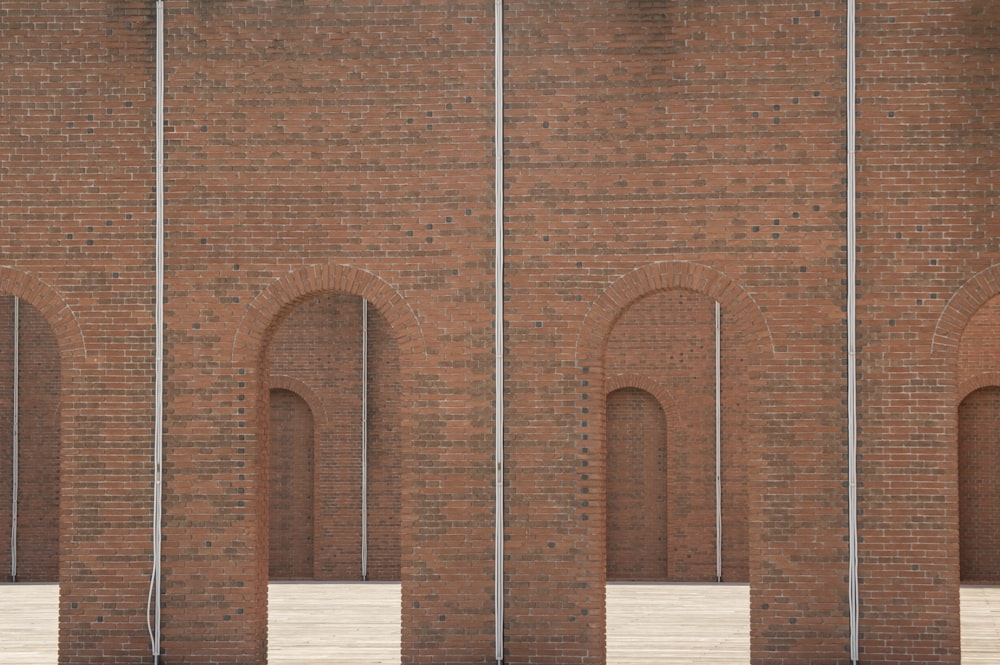 brown brick wall during daytime