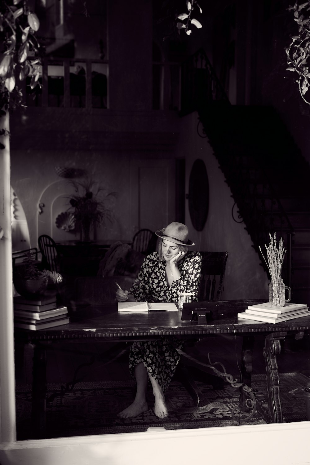 woman in black and white polka dot hijab sitting on chair