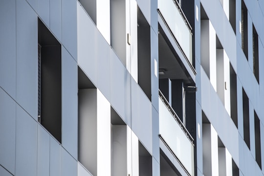 Sleek commercial building facade showcasing minimalist architecture and premium materials.