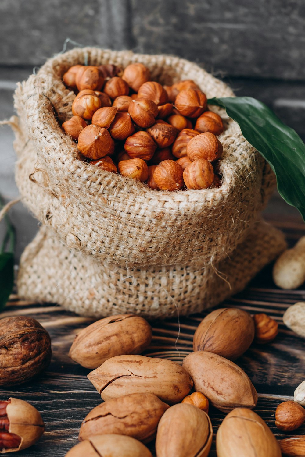 brown round nut on white woven basket