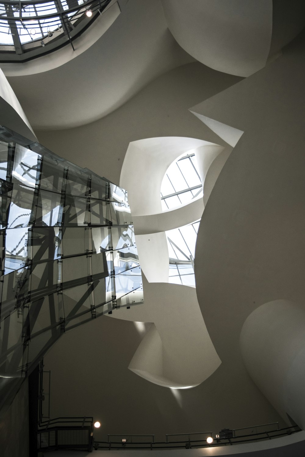 white and black glass walled building