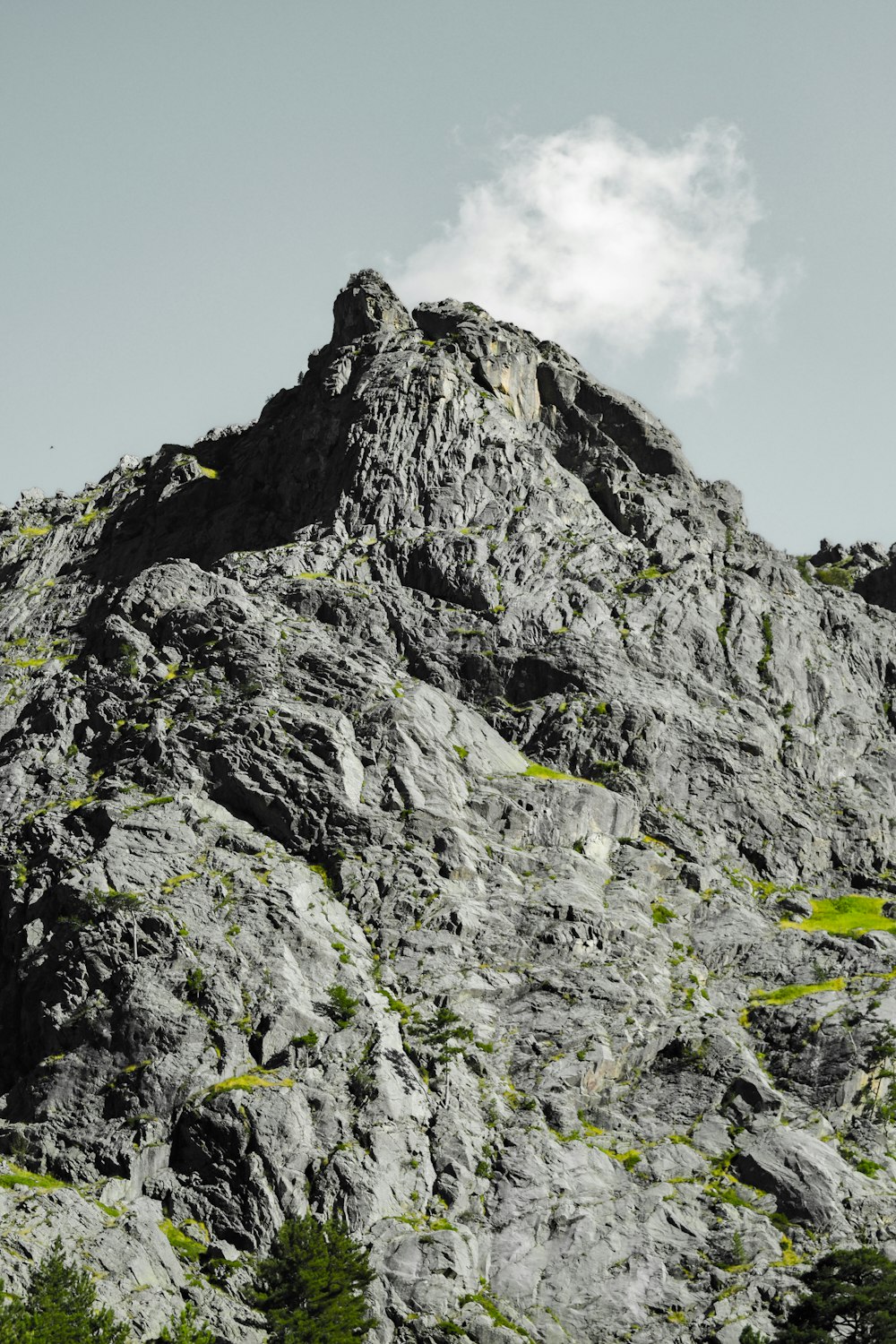 gray rocky mountain under blue sky during daytime