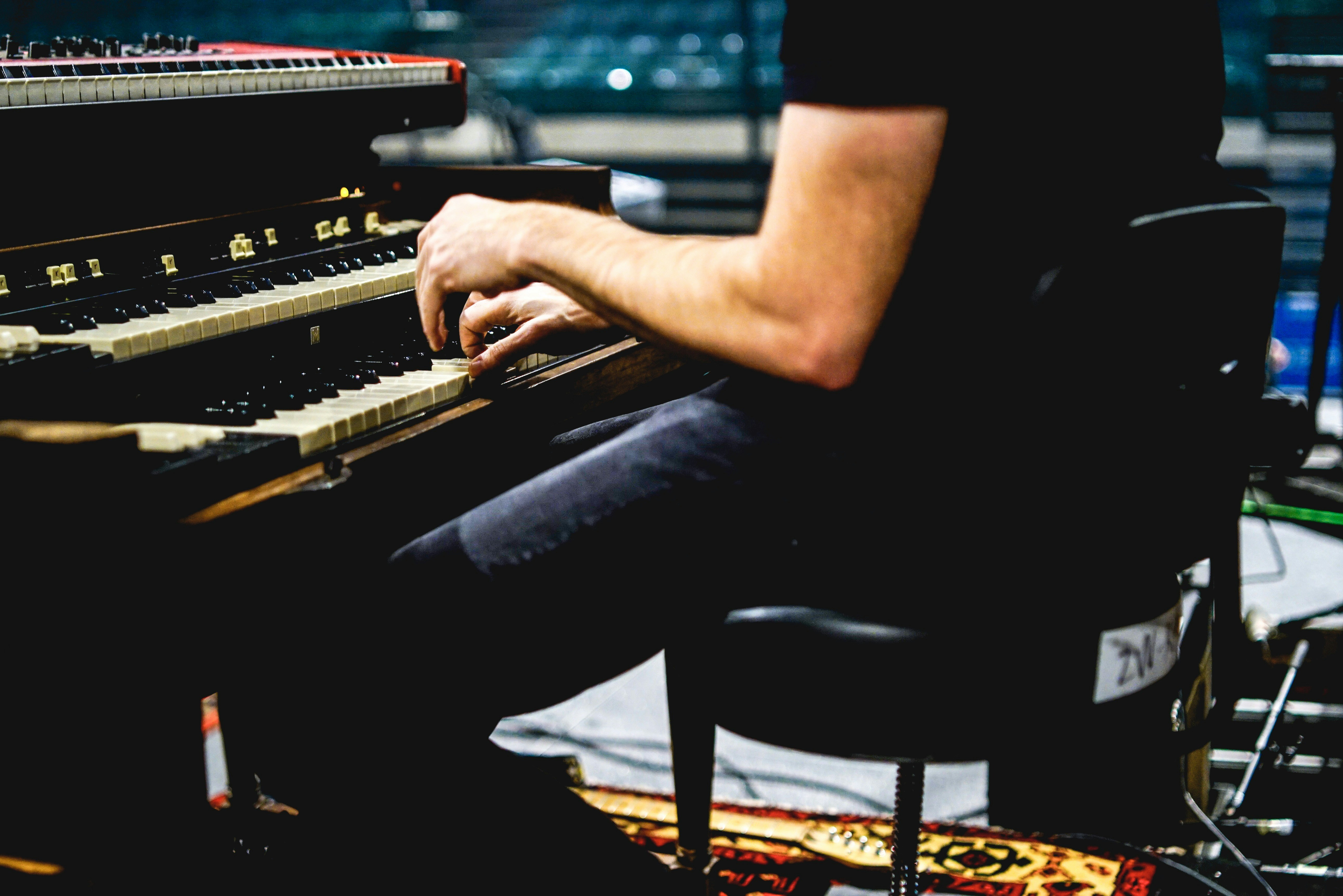 person playing piano on the street