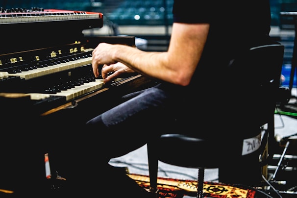 person playing piano on the street