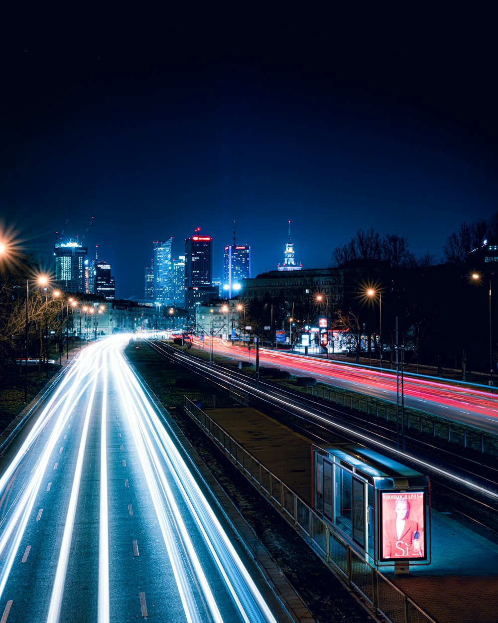 time lapse photography of cars on road during night time