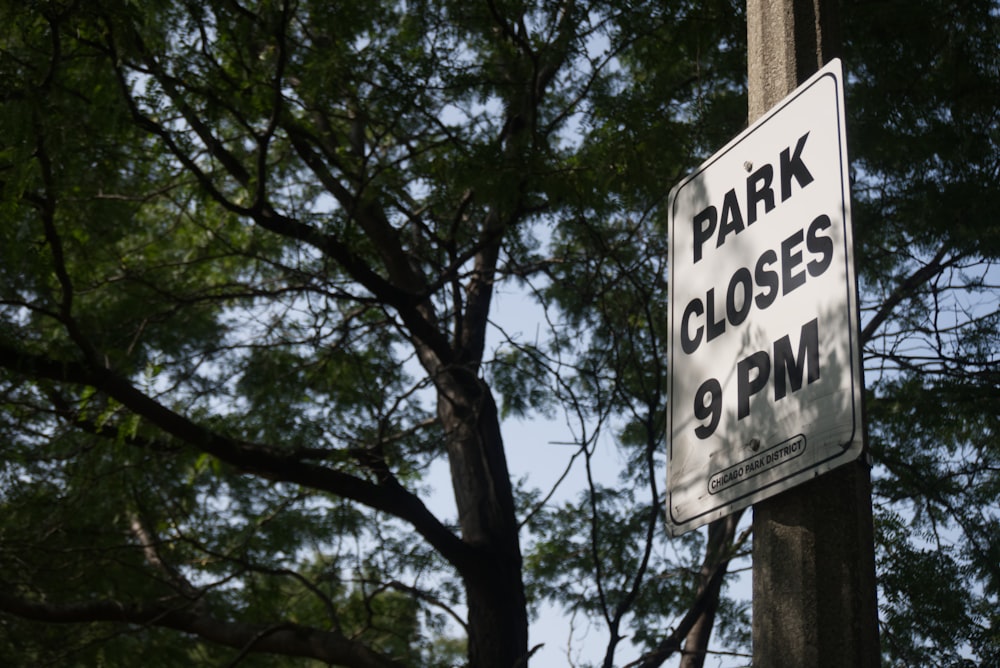 white and black wooden signage