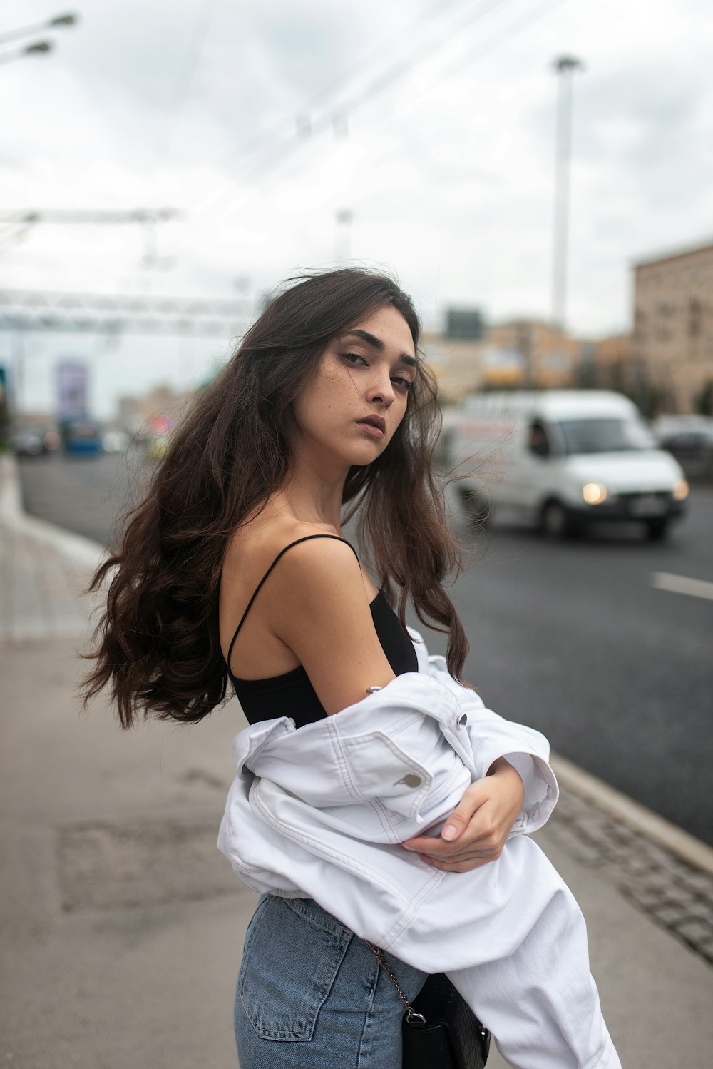 woman in white off shoulder dress