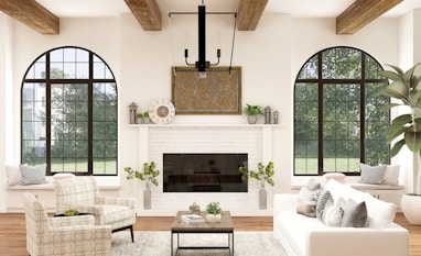 white sofa chair near fireplace