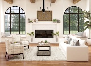 white sofa chair near fireplace