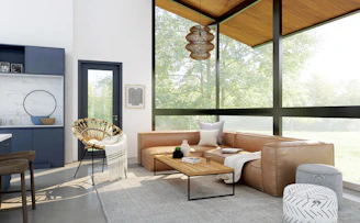 living room with brown sofa and glass window