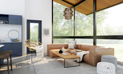 living room with brown sofa and glass window