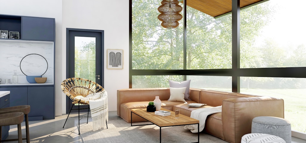 living room with brown sofa and glass window