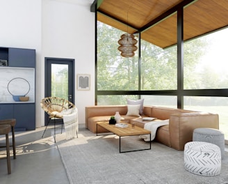 living room with brown sofa and glass window