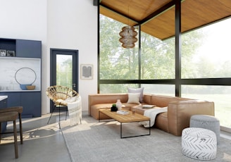 living room with brown sofa and glass window